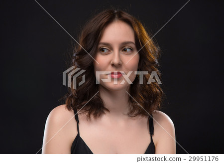 Portrait of looking right young brunette woman Portrait of looking right young brunette woman 29951176