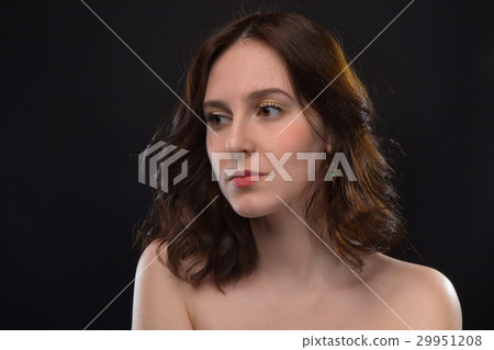 Portrait of brunette woman with nude shoulders 29951208
