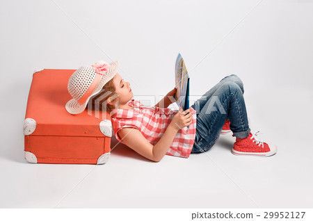 Child blonde girl with pink vintage suitcase and 29952127