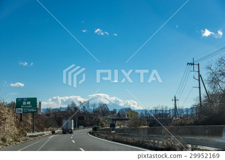Mt. Fuji can be seen beyond the track running on the central motorway 29952169