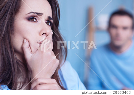 Thoughtful depressed woman focusing on her 29953463