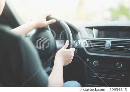 Asian man driving a car Asian man driving a car 29954845