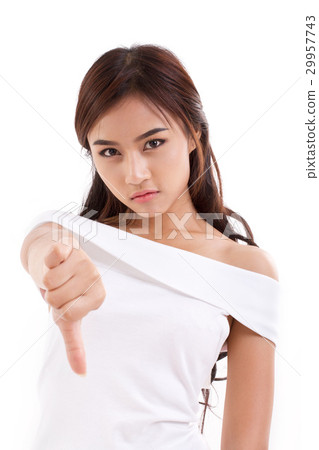 woman giving thumb down, white isolated background woman giving thumb down, white isolated background 29957743