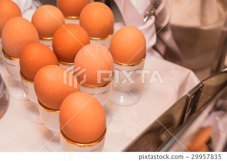 Boiled eggs in egg cups Boiled eggs in egg cups 29957835