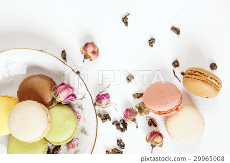 Multicoloured macaroons and tea Multicoloured macaroons and tea 29965008