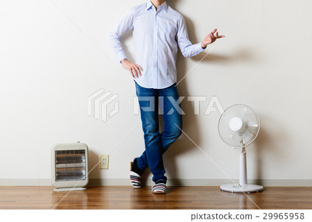 Fan and electric stove, standing man Fan and electric stove, standing man 29965958