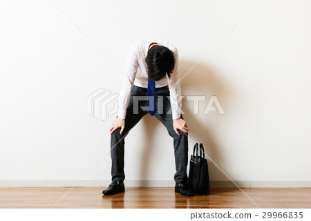 Tired businessman Tired businessman 29966835
