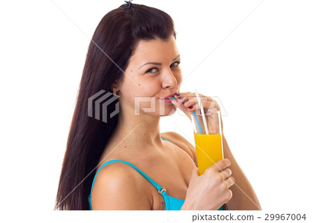 Woman in swimming suit holding cocktail Woman in swimming suit holding cocktail 29967004