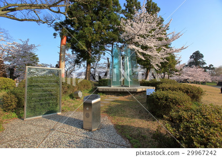 Tsuruoka Park Monument on snowy city 29967242
