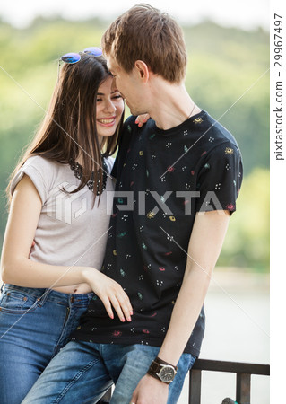 Caucasian couple taking a walk in the park 29967497