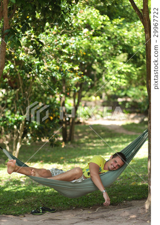 Man in a hammock Man in a hammock 29967722