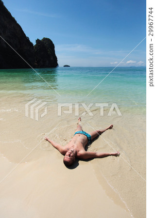 Man at the beach shore Man at the beach shore 29967744