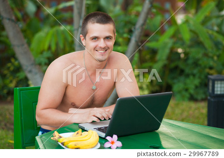 Man with laptop Man with laptop 29967789