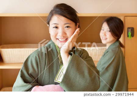 Two women enjoying a hot spring trip Two women enjoying a hot spring trip 29971944