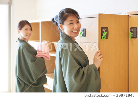 Two women enjoying a hot spring trip 29971945