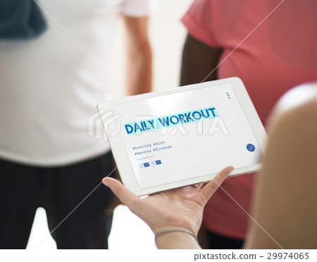 Hands working on digital device network graphic overlay 29974065