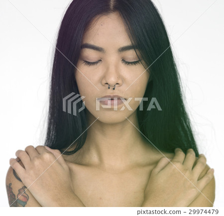 Tattoo Woman Shirtless Hugs Herself Studio Portrait 29974479