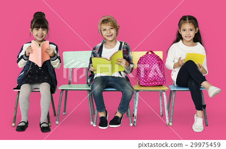 Happiness group of cute and adorable students reading book 29975459