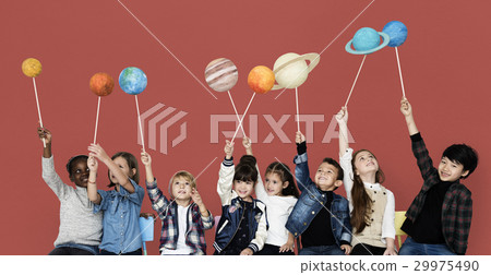Diverse group of kids holding planets on sticks isolated background 29975490