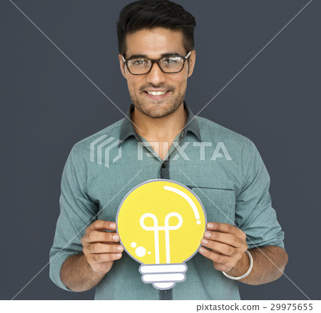 A man holding light bulb with an ideas 29975655