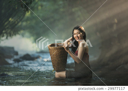 Asian sexy woman bathing in cascade 29977117