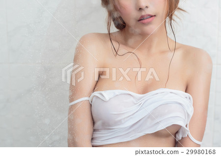 sexy young woman taking a shower sexy young woman taking a shower 29980168