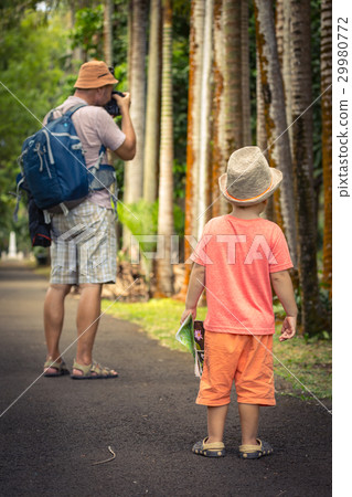 Father and son at botanical garden 29980772
