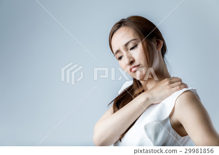 A woman with stiff shoulders A woman with stiff shoulders 29981856