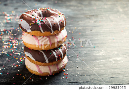 Stack of delicious donuts Stack of delicious donuts 29983955