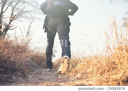 Young Man Traveler with backpack relaxing outdoor. Young Man Traveler with backpack relaxing outdoor. 29983974