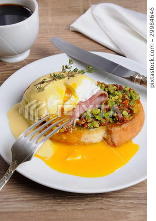 Toast with guacamole with egg Benedict Toast with guacamole with egg Benedict 29984646