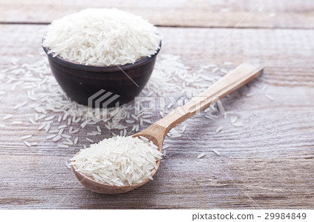 rice on a wooden background rice on a wooden background 29984849
