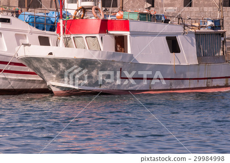Fishing boats anchored in Sicily, Italy. Fishing boats anchored in Sicily, Italy. 29984998