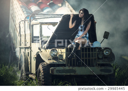 Asian model posing with old truck in an outdoor  Asian model posing with old truck in an outdoor  29985445