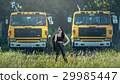 Asian model posing with truck in an outdoor  29985447