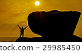 man celebrating his success top a mountain at suns 29985450
