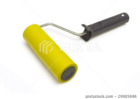 Yellow rubber paint roller on a white background Yellow rubber paint roller on a white background 29985696
