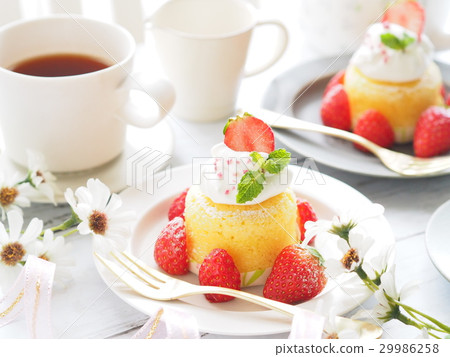 Tea time with cute strawberry cake 29986258
