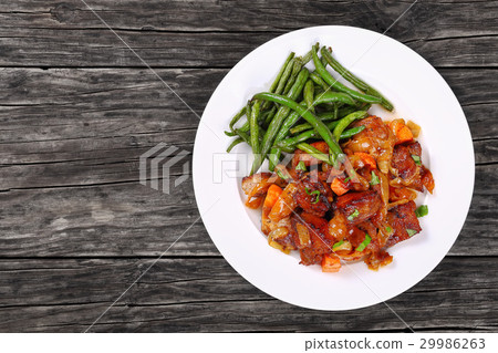 classic meat stew on white plate 29986263