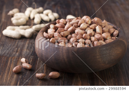 Peanuts in a wooden bowl 29988594