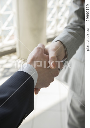 Business scene handshake 29990119