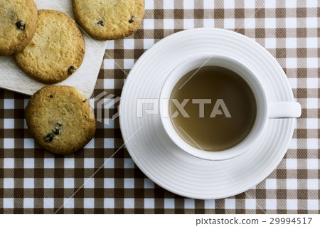 Coffee and Cookies on table. Coffee and Cookies on table. 29994517