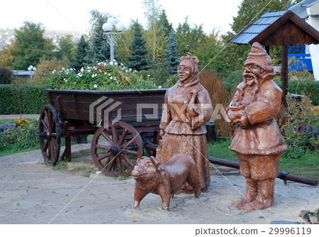 wood statue of ukrainian peasants 29996119