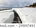 Lumps of ice on the shore of the northern sea 29997491