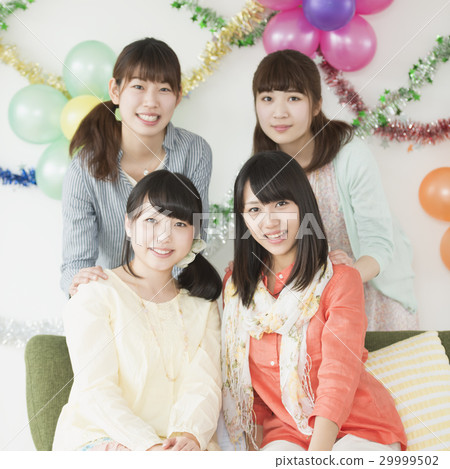Four women smiling Four women smiling 29999502