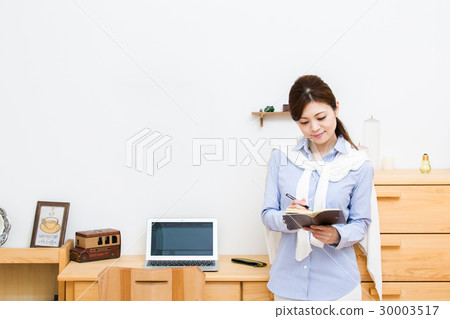 A woman in the study A woman in the study 30003517