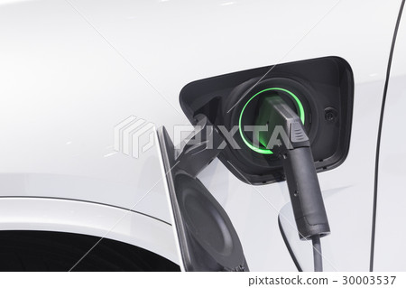 The electric car charger plugged 30003537