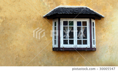 Old wooden window on yellow concrete wall. Old wooden window on yellow concrete wall. 30005547