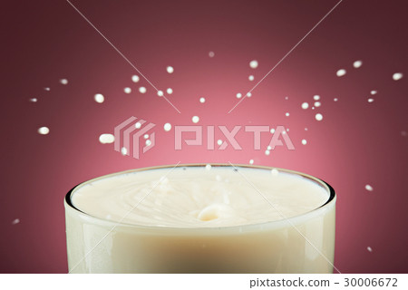close up of milk splashes close up of milk splashes 30006672