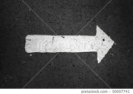 White arrow over black highway asphalt White arrow over black highway asphalt 30007741
